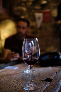 Close-up of wine glass on table