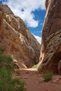 Rock formations on mountain against sky