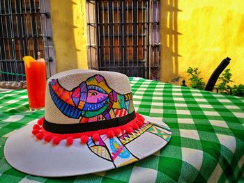 Close-up of hat on table