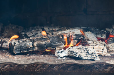 Close-up of fire on barbecue grill