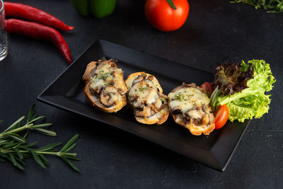 High angle view of vegetables in plate on table