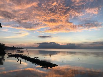 Scenic view of lake against sky during sunset