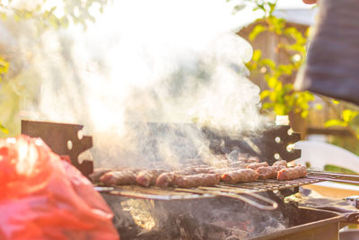 Close-up of meat on barbecue grill