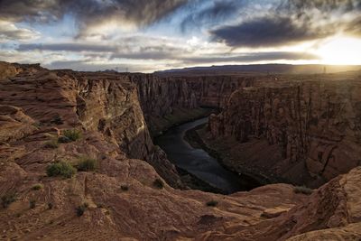 Scenic view of landscape against sky during sunset