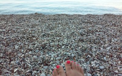 Low section of woman on beach