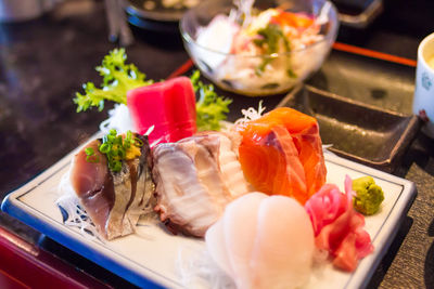 Close-up of served food on table