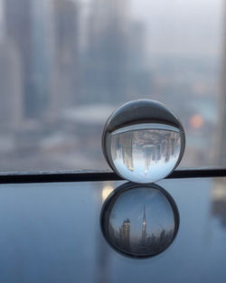 Close-up of crystal ball on table