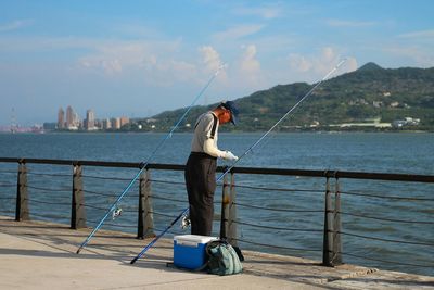 Man looking at river