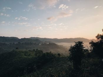 Scenic view of mountains against sky during sunset