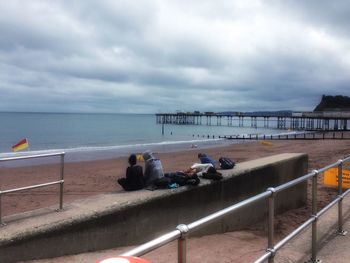 Scenic view of sea against cloudy sky