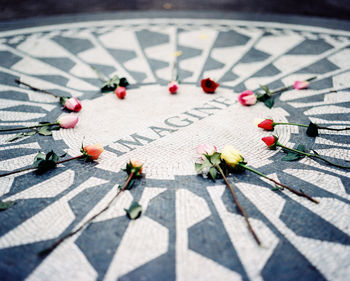 High angle view of text on floor in city