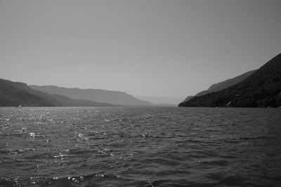 Scenic view of a lake against clear sky