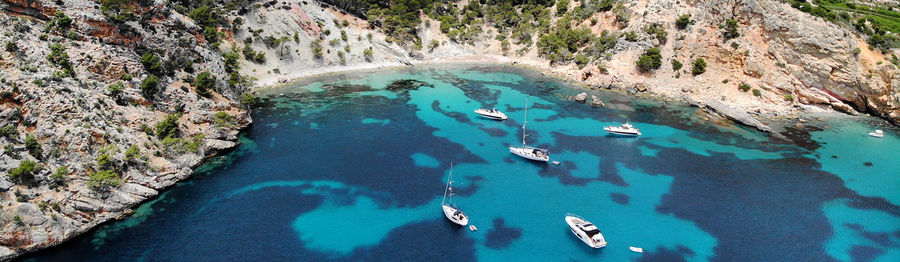 High angle view of rocks in sea