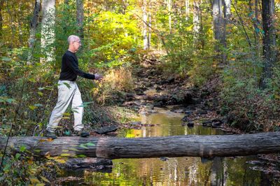 Man standing in forest