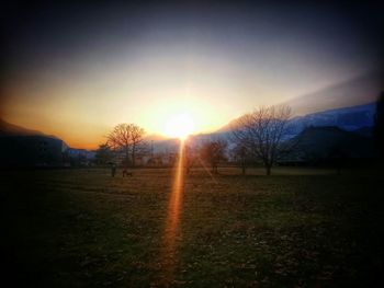 Scenic view of landscape at sunset