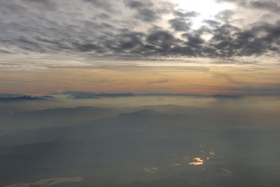 View of calm sea at sunset