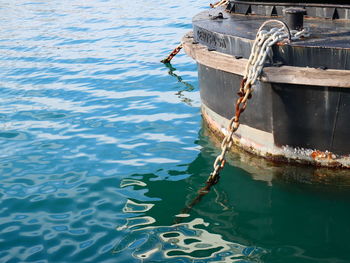 High angle view of rope tied on boat