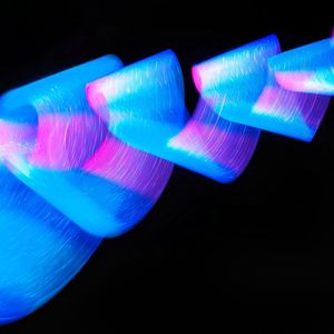 Close-up of light painting against black background