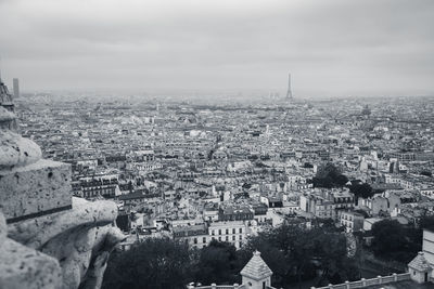 View of paris from the sacre couere basilica with the eiffel tower standing high