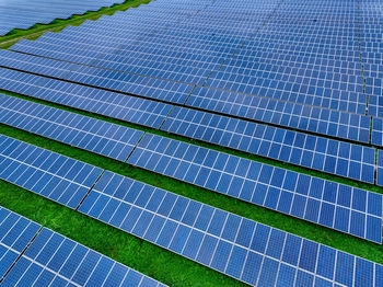 Aerial view of solar farm. sustainable renewable energy and modern photovoltaic technology for eco