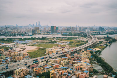 High angle view of buildings against sky in city