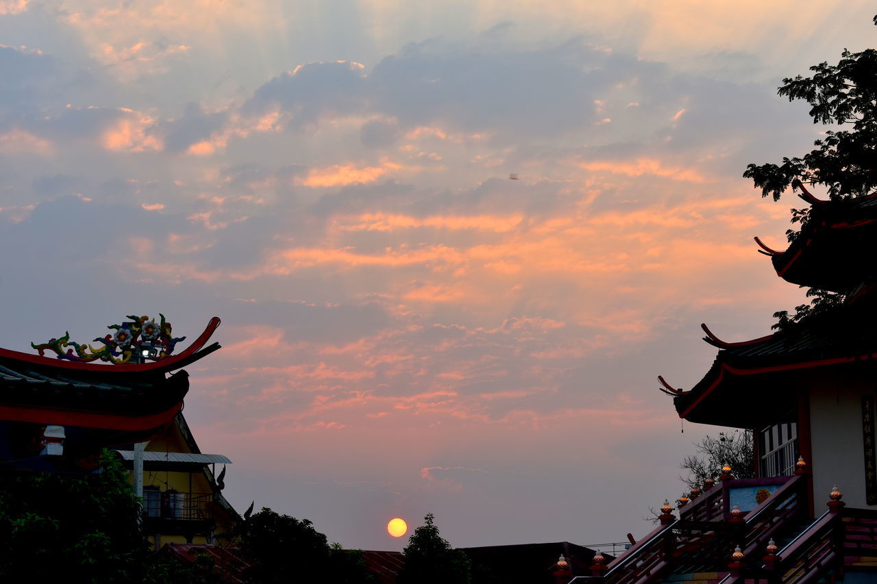 LOW ANGLE VIEW OF SILHOUETTE TEMPLE AGAINST SKY