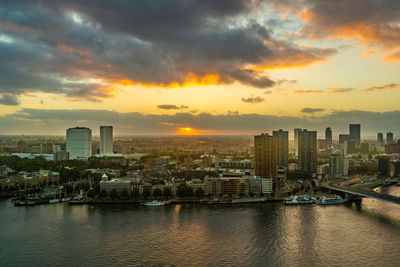 Scenic view of buildings against sky during sunset