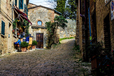 Narrow alley along buildings