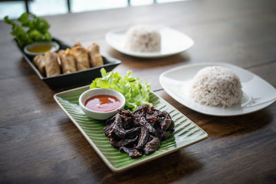 High angle view of food served on table