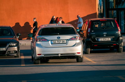 Cars parked on street in city