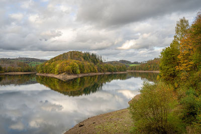 Panoramic image of agger lake close to gummersbach in evening light, bergisches land, germany