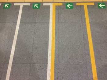 High angle view of zebra crossing on railroad station