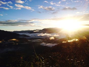 Scenic view of landscape against sky during sunset