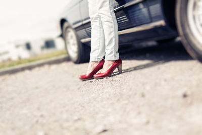 Low section of person on road