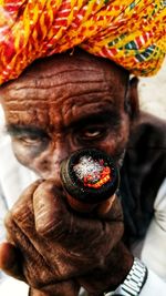 Portrait of man smoking cigar