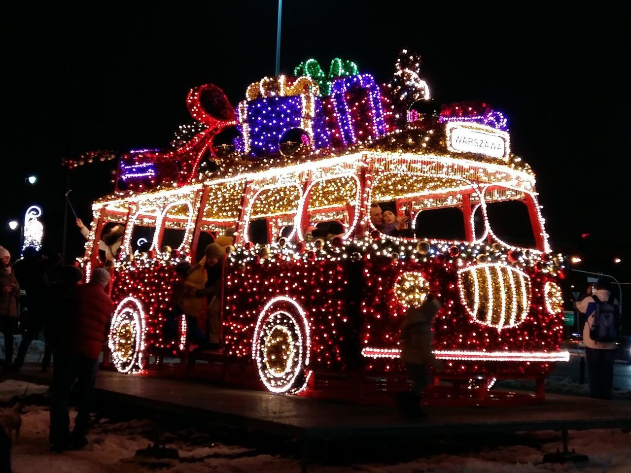 ILLUMINATED CAROUSEL AT NIGHT