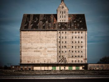 View of building against cloudy sky