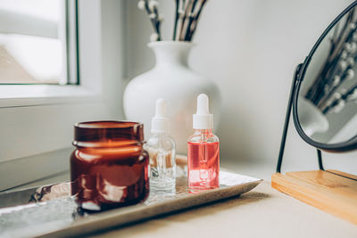 Close-up of beauty products on table