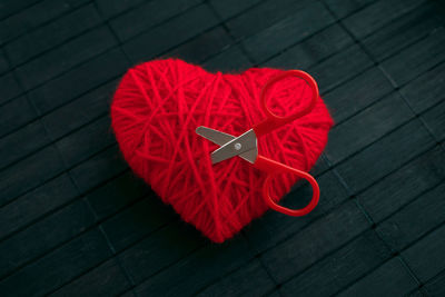 High angle view of red heart shape on table