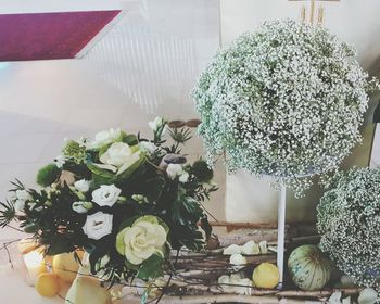 Close-up of flower vase on table