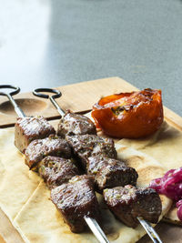 Close-up of meat on cutting board