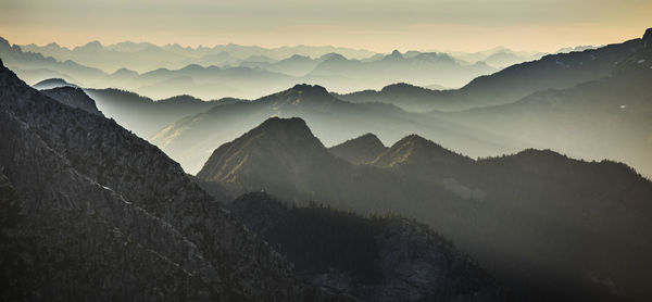 Scenic view of mountains against sky during sunset