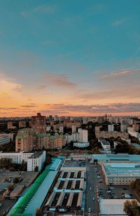 High angle view of buildings against sky during sunset