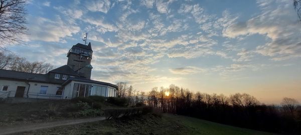 Building against sky during sunset