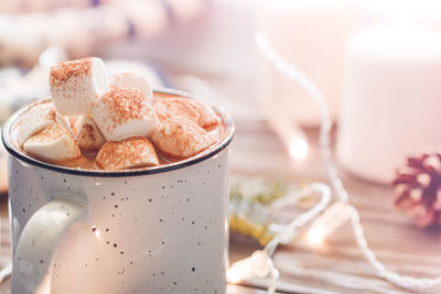 Close-up of marshmallows in coffee on table