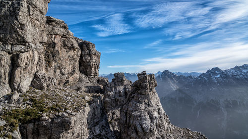 Scenic view of rocky mountains against sky