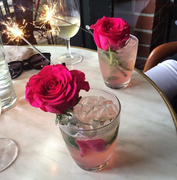 flower, freshness, table, glass - material, vase, petal, rose - flower, drinking glass, close-up, fragility, indoors, flower head, glass, restaurant, water, arrangement, flower arrangement, no people, pink color, beauty in nature