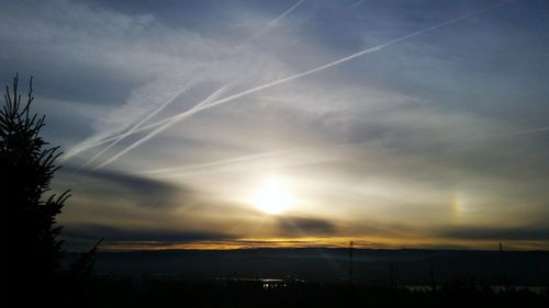 Scenic view of vapor trails in sky