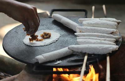 Close-up of person preparing food