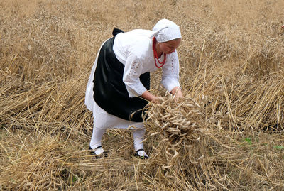 Full length of man working on field